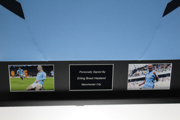 Camiseta local enmarcada del Manchester City 24/25 de Erling Braut Haaland